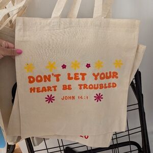 Don't let your heart be troubled tote bag